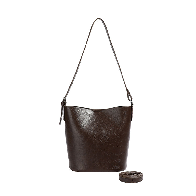 今年流行的包包2025新款春季小众复古水桶包高级感百搭单肩斜挎包,淘宝优惠券,粉丝福利购,淘宝优惠卷