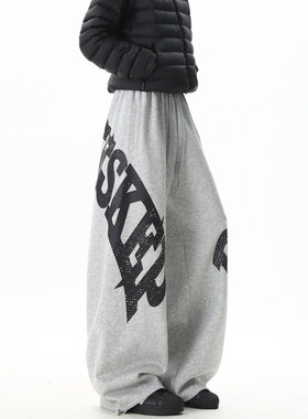 复古字母印花弯刀裤男