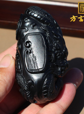 新疆留皮孔墨玉籽料飞龙在天把件