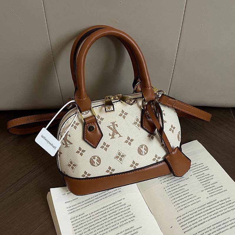 网红小众包包女士2025新款潮手提时尚质感贝壳包百搭斜挎单肩小包,淘宝优惠券,粉丝福利购,淘宝优惠卷