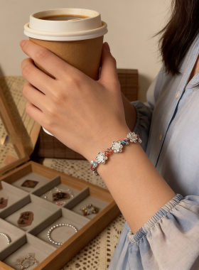 新中式莲花手链女2026新款轻奢精致国风彩绳编织手饰