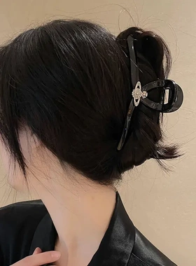 黑色翻转星球抓夹女后脑勺盘发夹