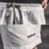 Mùa hè học sinh Nhật Bản quần short nam trắng cotton kích thước lớn bé trai năm quần quần thêu quần nam quần thủy triều - Quần short