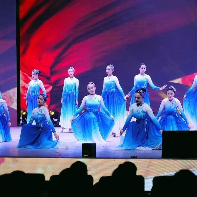 Beautiful Chinese big skirt blooms in the lights of Wanjiang