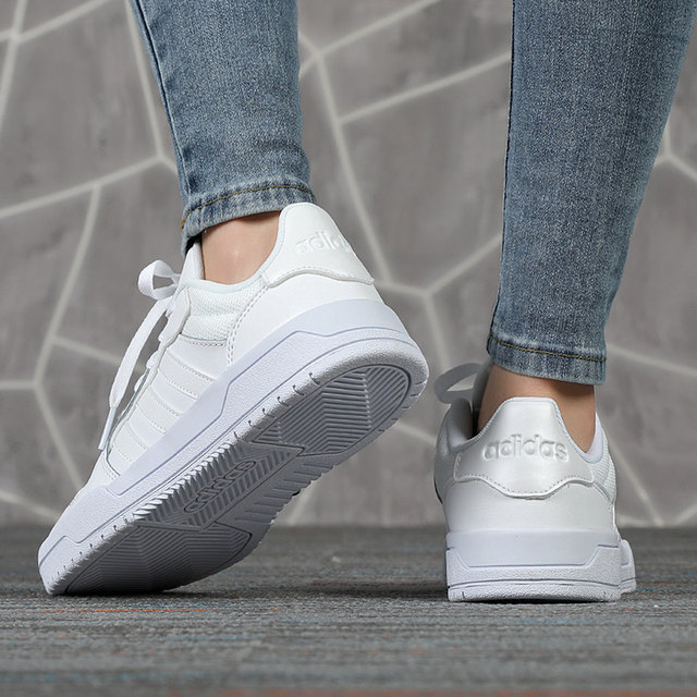 couple shoes adidas white