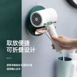 Сломанное окно стоящее стойка Уколочь удары по кронштейну Dyson Tube Wall -Связанная ванная комната для ванной комнаты в ванной комнате.