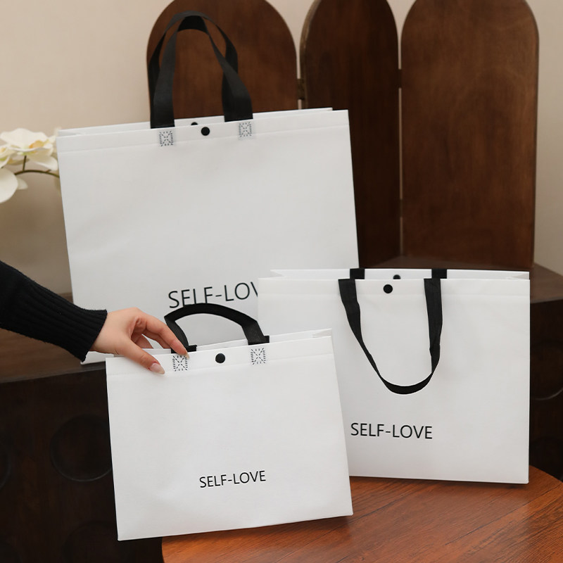 高级按扣覆膜无纺布袋大容量加厚环保女装购物袋服装店手提袋定制,淘宝优惠券,粉丝福利购,淘宝优惠卷