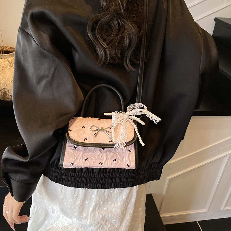 韩版小众蝴蝶结包包女式2025新款单肩斜挎包高级感波点手提小方包,淘宝优惠券,粉丝福利购,淘宝优惠卷