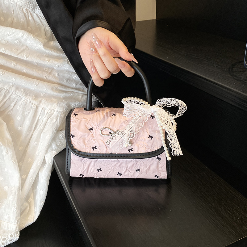 韩版小众蝴蝶结包包女式2025新款单肩斜挎包高级感波点手提小方包,淘宝优惠券,粉丝福利购,淘宝优惠卷