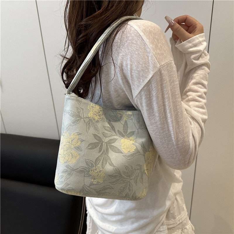 新中式国风包包女式2025新款流行时尚超火单肩包大容量通勤水桶包,淘宝优惠券,粉丝福利购,淘宝优惠卷