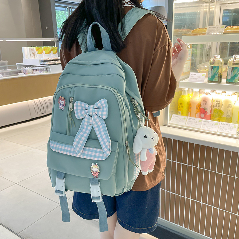 新款可爱小学生三到六年级初中生大容量背包女生双肩包高中生书包