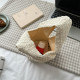 Wrist bag embossed small Japanese and Korean simple versatile wrist bag