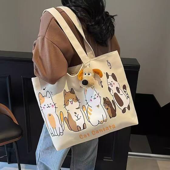 Cute Cartoon Canvas Bag Women's Large Capacity 2025 New Casual Versatile Shoulder Bag Hand Bag Commuting Tote Bag