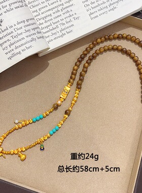 金色古法点钻花丝如意可转动吊坠尖晶石镂空铃兰花双钩链女