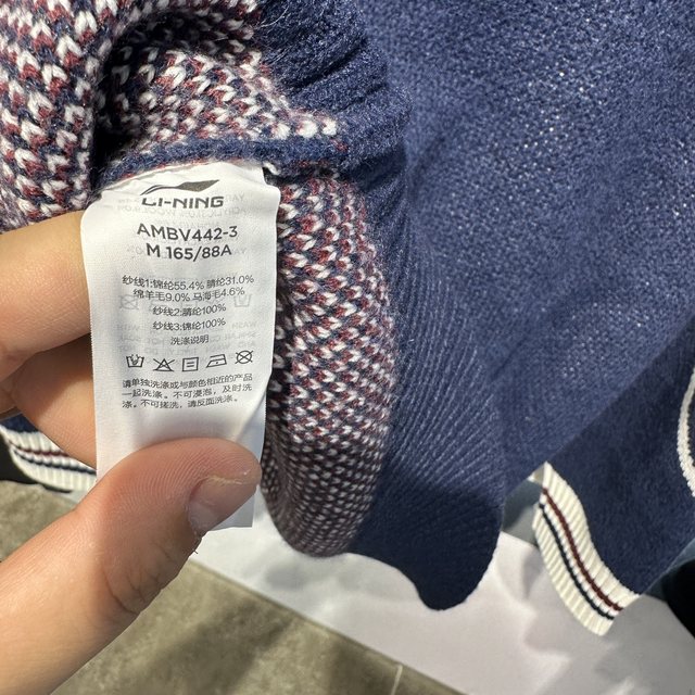 China Li Ning 25 winter new women's trendy loose stand-up collar half cardigan woven pullover sweatshirt AMBV442