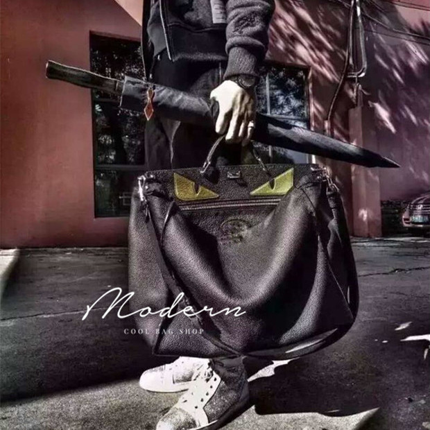 头层牛皮孙红雷同款眼睛小怪兽恶魔公文包男包手提高品质 modern 头层牛皮孙红雷同款眼睛小怪兽恶魔公文包男包手提高品质 modern