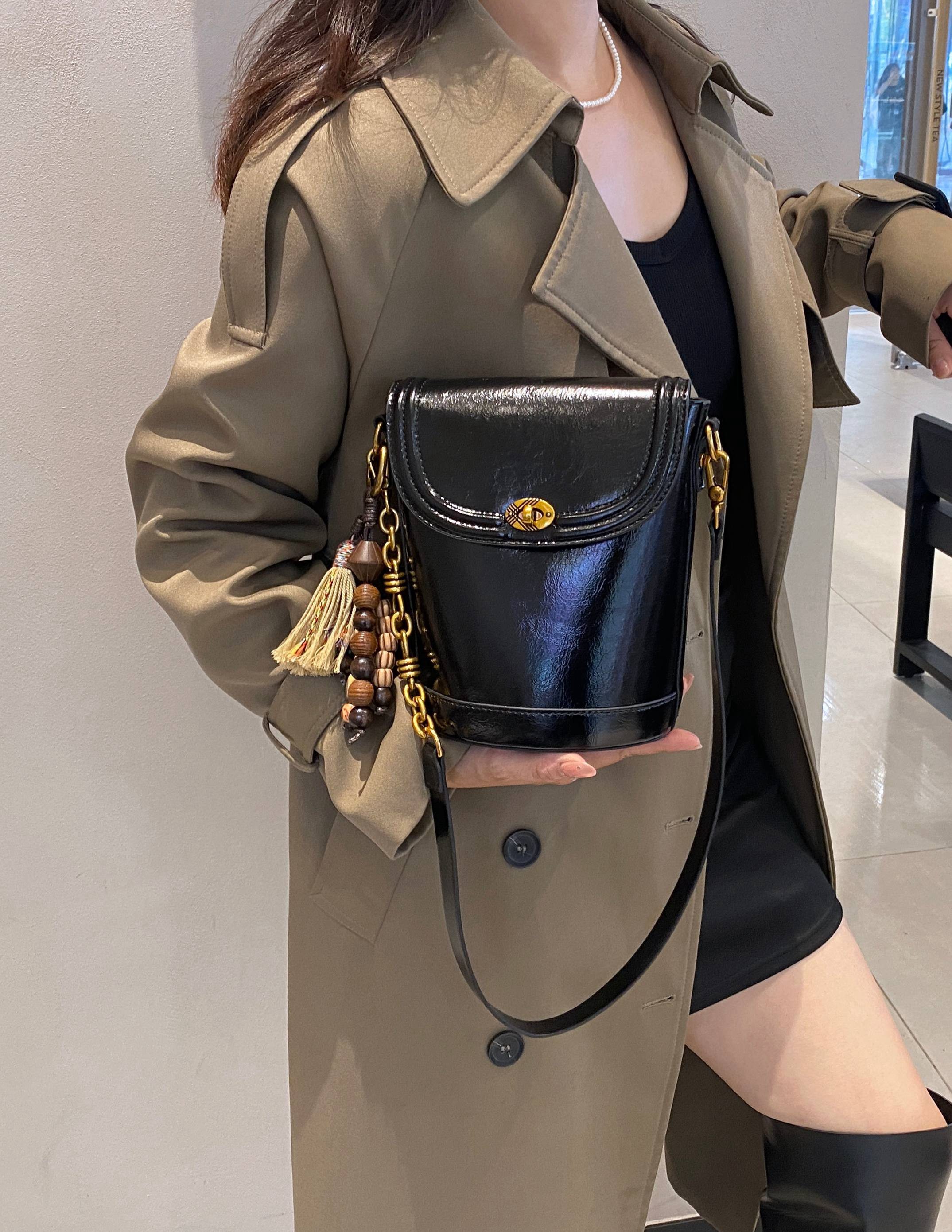 美缇2026新款女包高级感小众设计水桶包时尚百搭单肩斜挎包小包包,淘宝优惠券,粉丝福利购,淘宝优惠卷