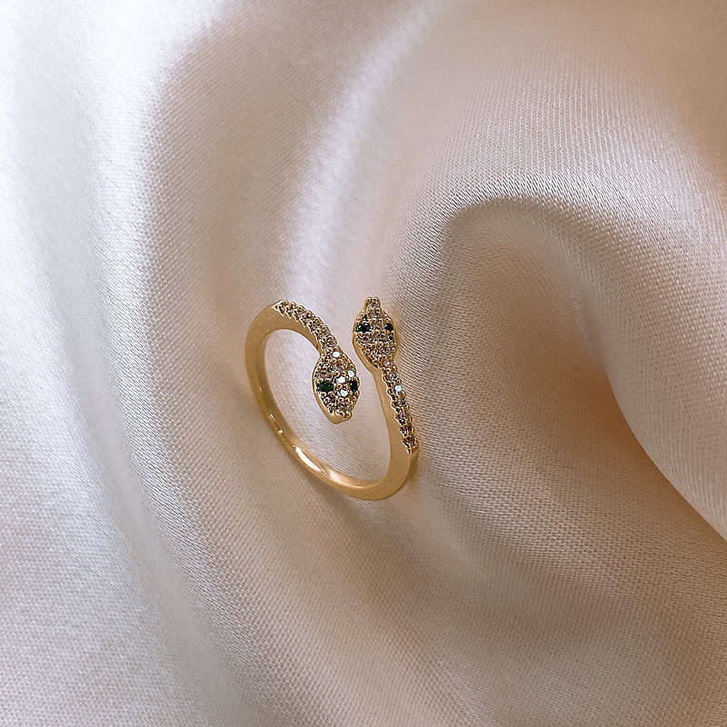 Korean style double-headed snake-shaped open ring with diamonds