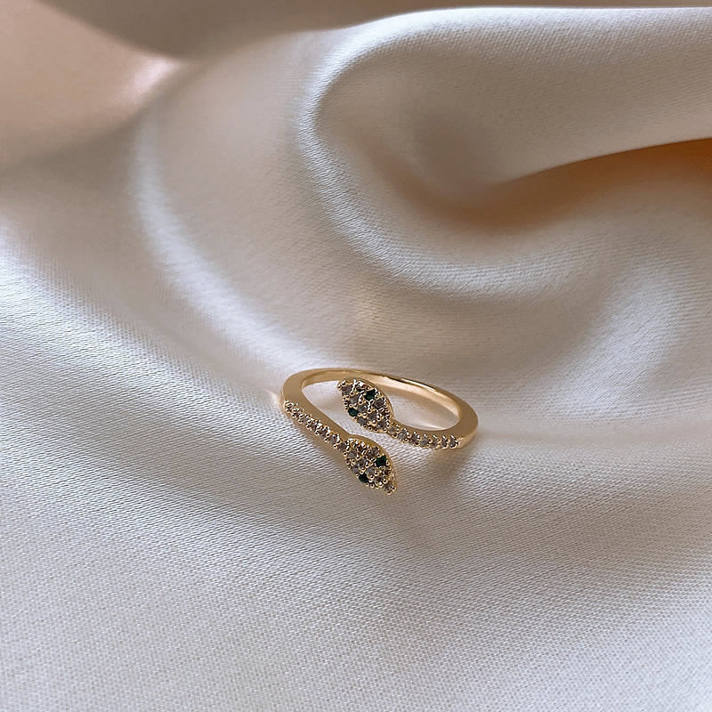 Korean style double-headed snake-shaped open ring with diamonds