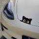 Black cat peeking at car electric motorcycle sticker