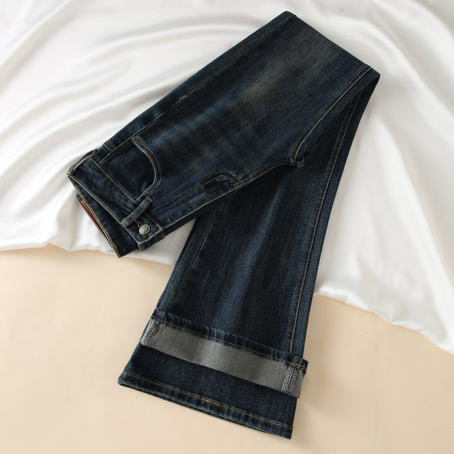 Jeans bootcut ແອວສູງດູໃບໄມ້ລົ່ນຂອງແມ່ຍິງ