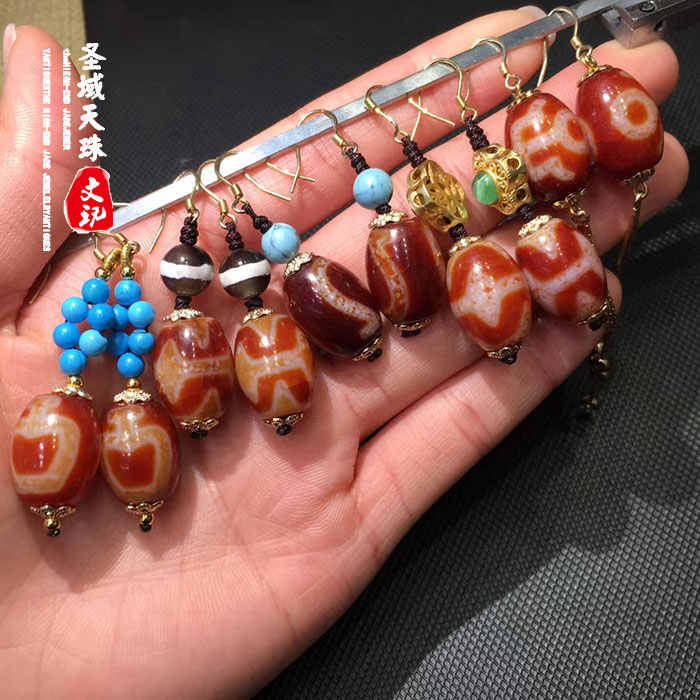 ポケットいっぱい 透明赤玉髓天然多眼天珠 ハンドメイド彫刻 長さ56