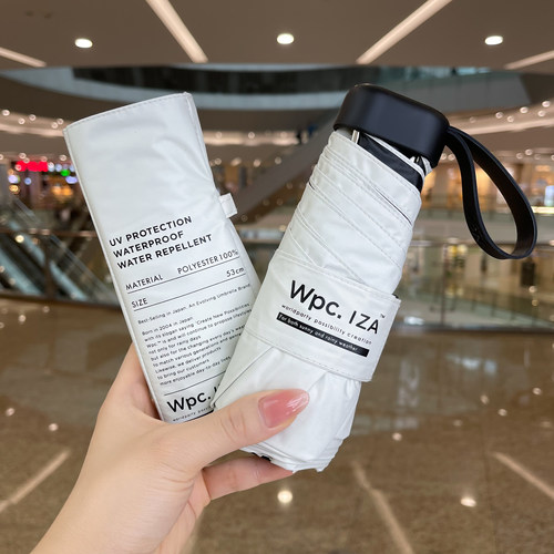 日本Wpc五折男女中性太阳伞IZA晴雨纯色黑胶折叠防晒紫外线遮阳伞 - 图3