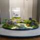 Decorative bonsai flowers in the middle of the dining table
