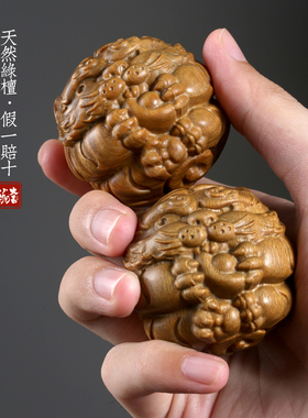 绿檀木雕送财虎保健球