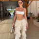 Music festival hottie bi wears ruffled high-waisted casual pants