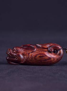 海南黄花梨紫油梨鱼化龙手把件