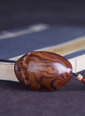 海南黄花梨富甲天下手把件鬼脸纹