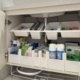 Bathroom sink storage rack