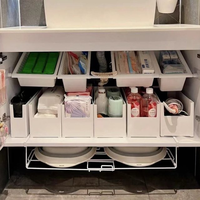Bathroom sink storage rack