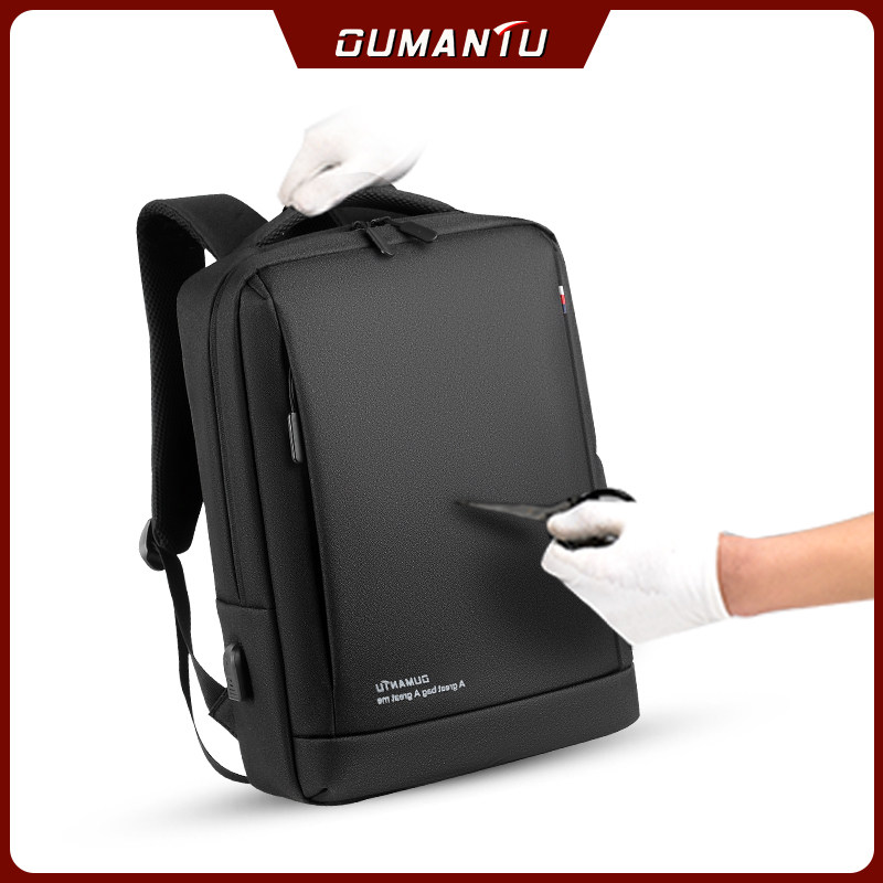 男士休闲旅行潮流学生防水女电脑包 欧曼图箱包双肩背包