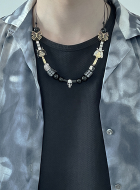 潮牌钛钢双枪子弹筛子骷髅头项链