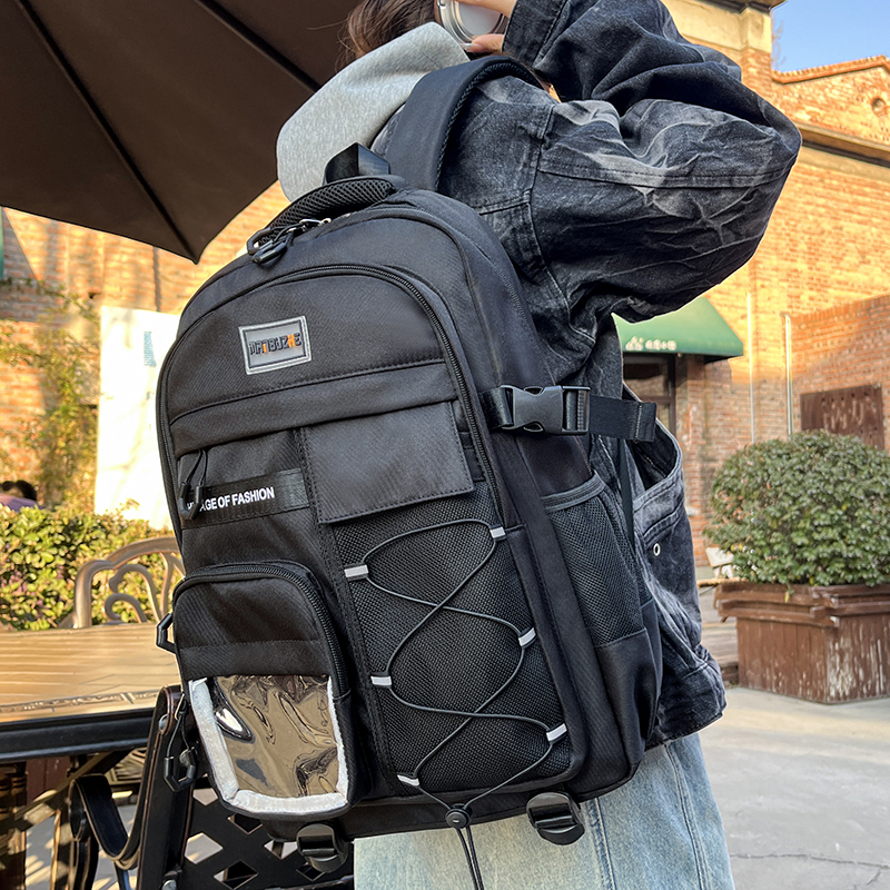 新款小学生初中生背包女减负护脊中学生书包高中男生大容量双肩包 - 图1