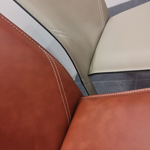意式轻奢马鞍皮椅子北欧餐椅现代简约休闲餐桌靠背椅家用马鞍革凳 - 图1