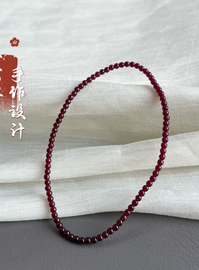 2026新款极细2mm石榴红酒红色小米珠弹力绳手链女款简约百搭手串