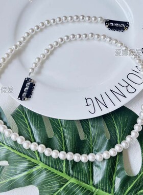 丸子头少女珍珠头饰发夹点缀马尾