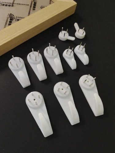 相框无痕钉强力挂钩墙上照片墙婚纱照专用隐形墙钉子壁挂画免打孔 - 图0