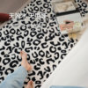 Saipos glue-free bedside blanket has a mid-century design