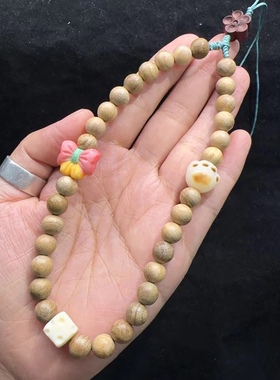 8MM奶香木手机链搭配蝴蝶结跟付菩提根猫爪象牙果奶酪手串