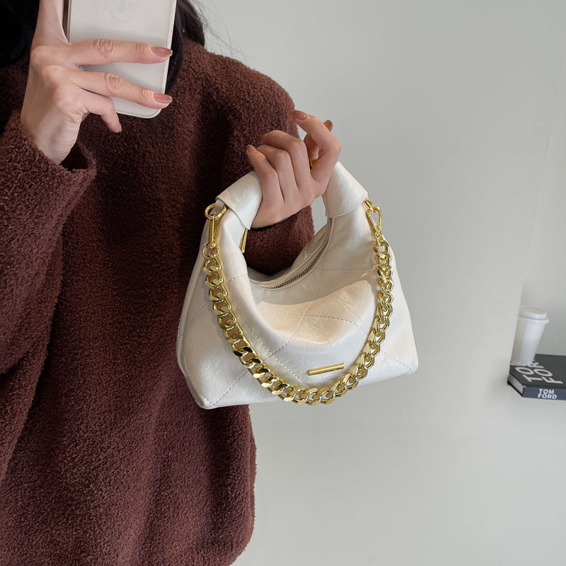 小众设计质感通勤手提女包包2025冬季新款复古菱格链条斜挎饺子包,淘宝优惠券,粉丝福利购,淘宝优惠卷