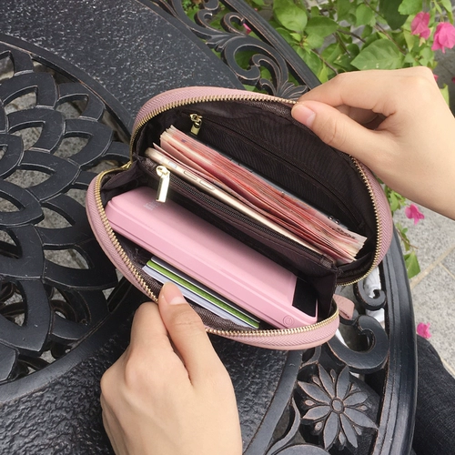 Вместительная и большая демисезонная кожаная маленькая сумка клатч, коллекция 2021, из натуральной кожи