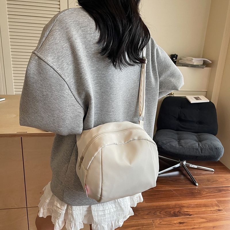 轻便尼龙布小众2025新款贝壳包帆布休闲单肩斜挎包女防水大容量,淘宝优惠券,粉丝福利购,淘宝优惠卷