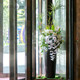Hotel revolving door artificial flowers