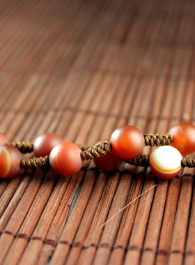 阜新风缠丝玛瑙磨砂珠子长款吊坠