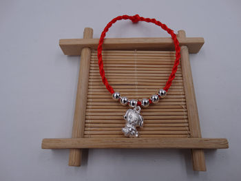 ປີໃໝ່ຂອງໝາ 999 sterling silver bead anklet with red thread 99 pure silver pure prosperous dog pendant bracelet with red thread