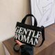 Korean high-end canvas bag for women, small portable bucket bag, mini mobile phone shoulder bag, spring seaside cross-body bag